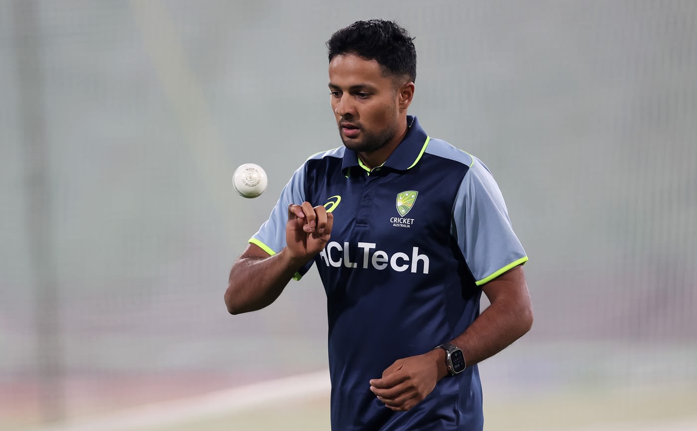 Tanveer Sangha prepares to bowl at the nets