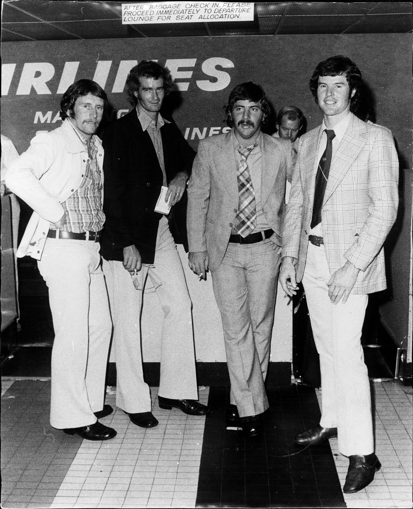 Ian Chappell, Ashley Mallett, Rod Marsh and Ashley Woodcock arrive at Sydney airport