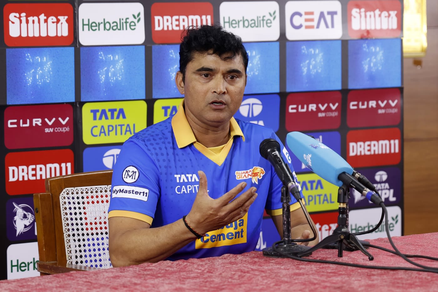 Pravin Tambe, Giants' bowling coach, addresses the press