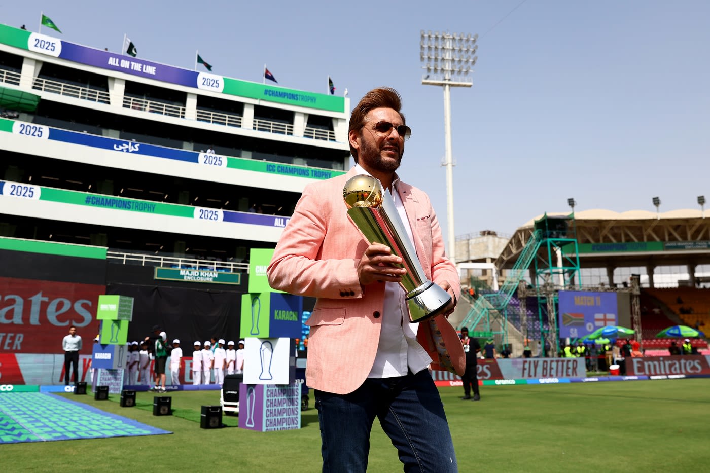 Former Pakistan captain Shahid Afridi walks out with the Champions Trophy