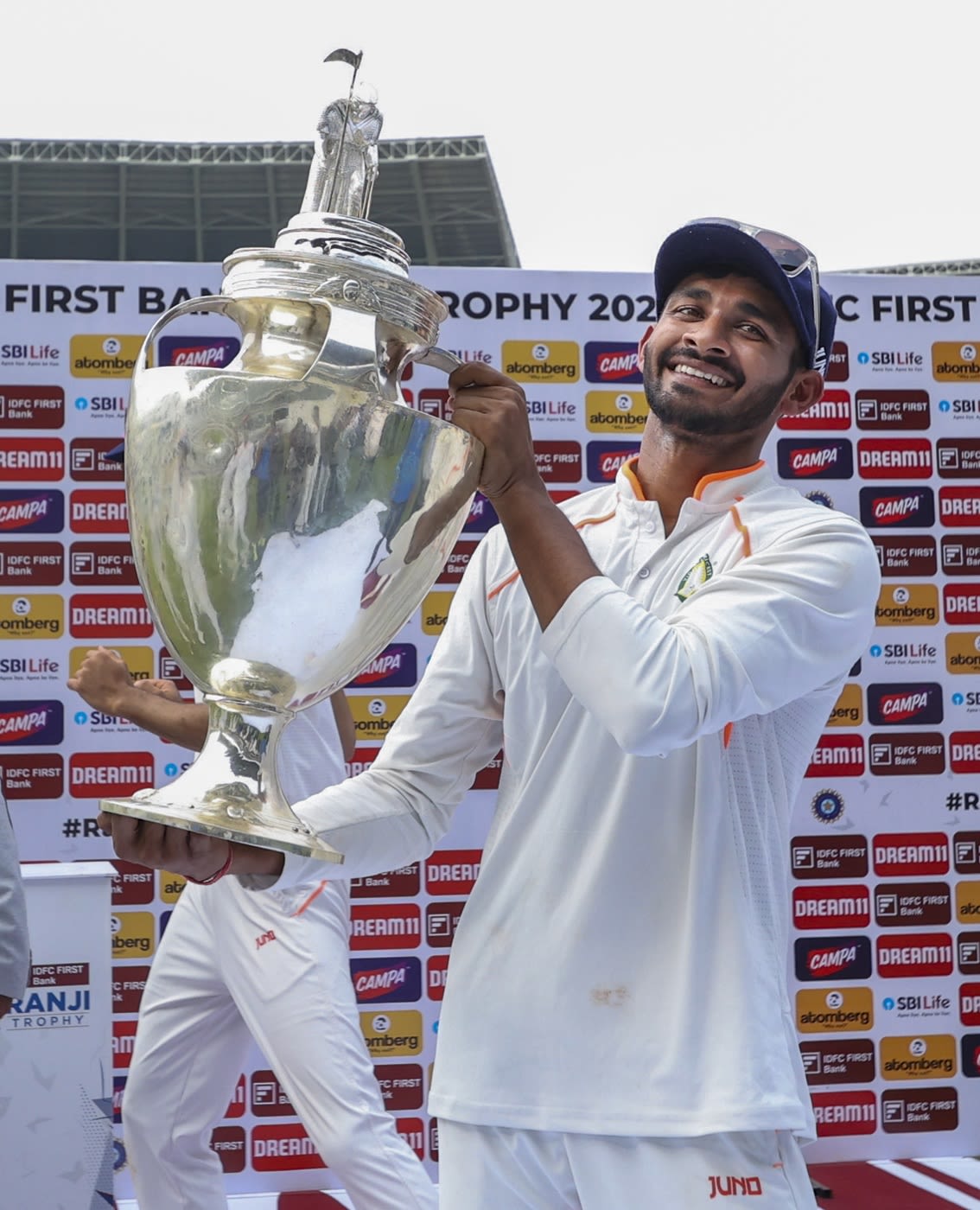 Vidarbha captain Akshay Wadkar with the trophy