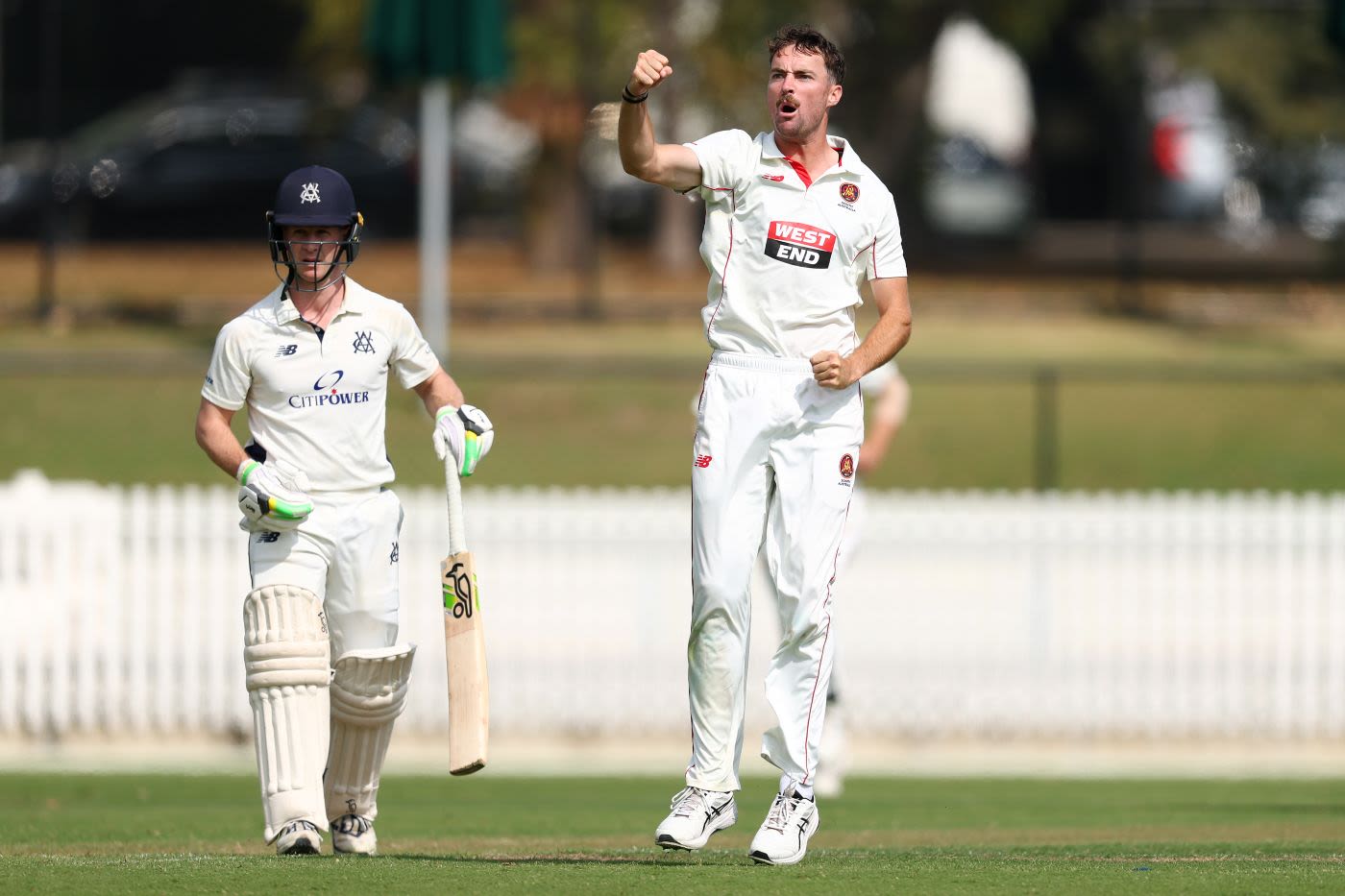 Jordan Buckingham celebrates the wicket of Sam Harper