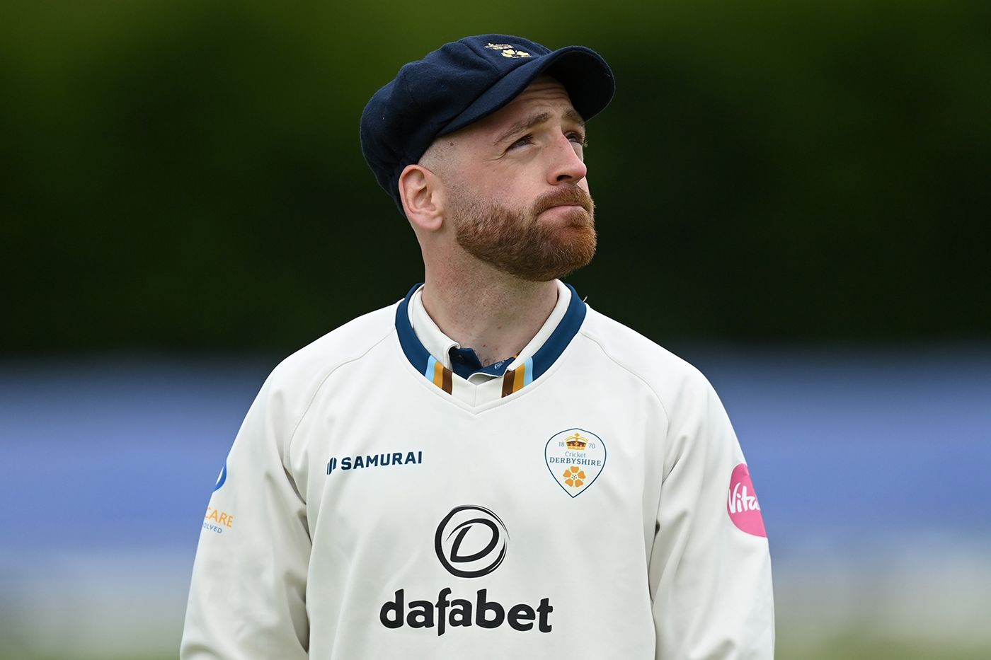Derbyshire captain David Lloyd looks to the skies