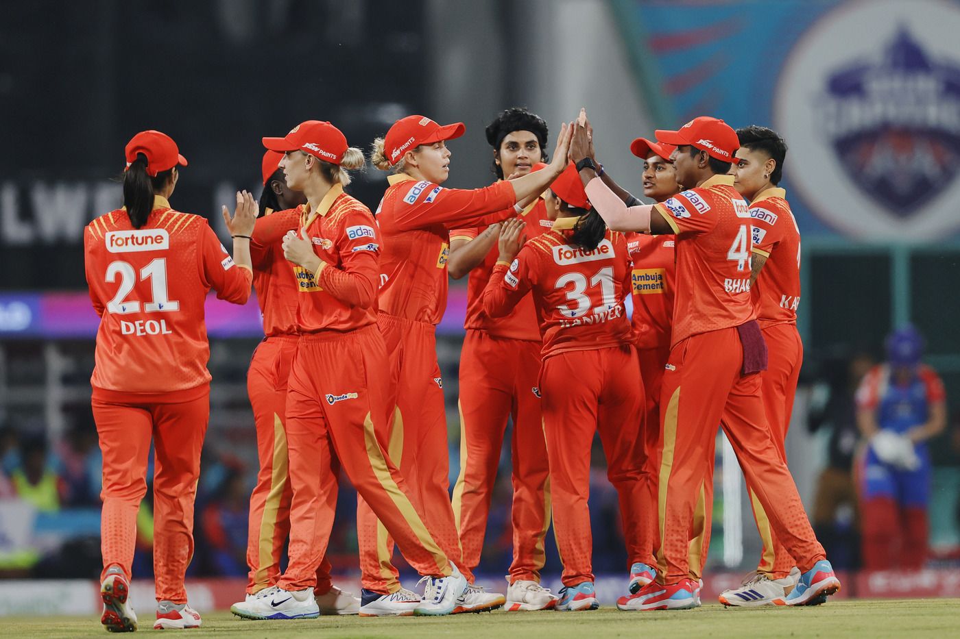 Meghna Singh is mobbed by her team-mates