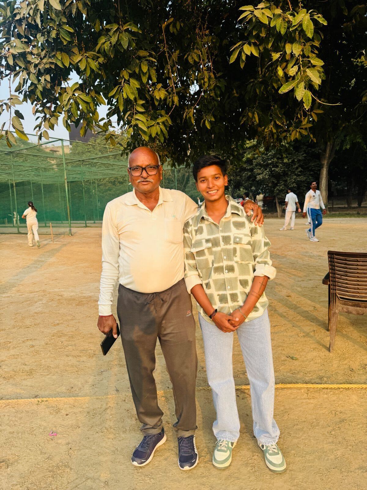 Priya Mishra with her childhood coach Shravan Kumar at his West Delhi Academy.
