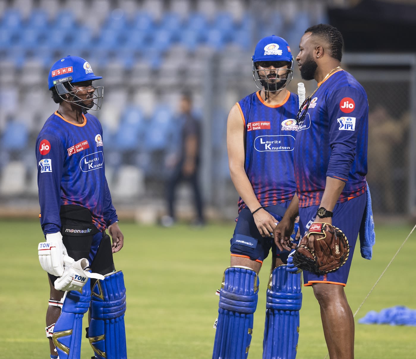 Kieron Pollard chats with Naman Dhir and Robin Minz
