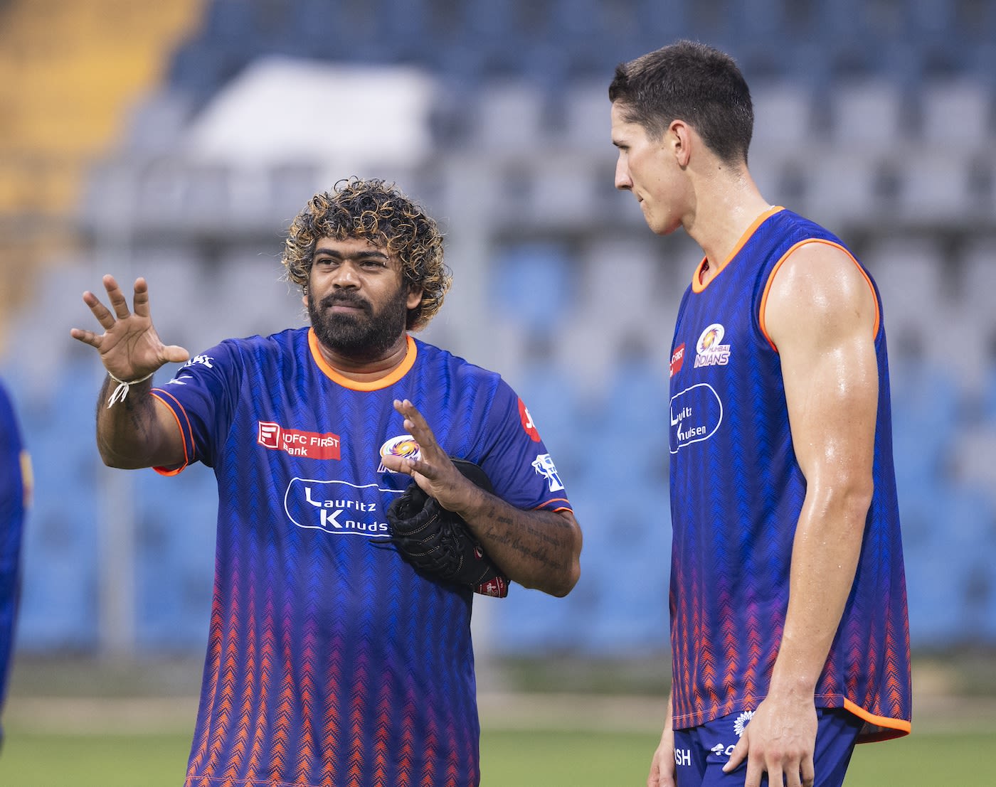 Lasith Malinga makes a point to Bevon Jacobs