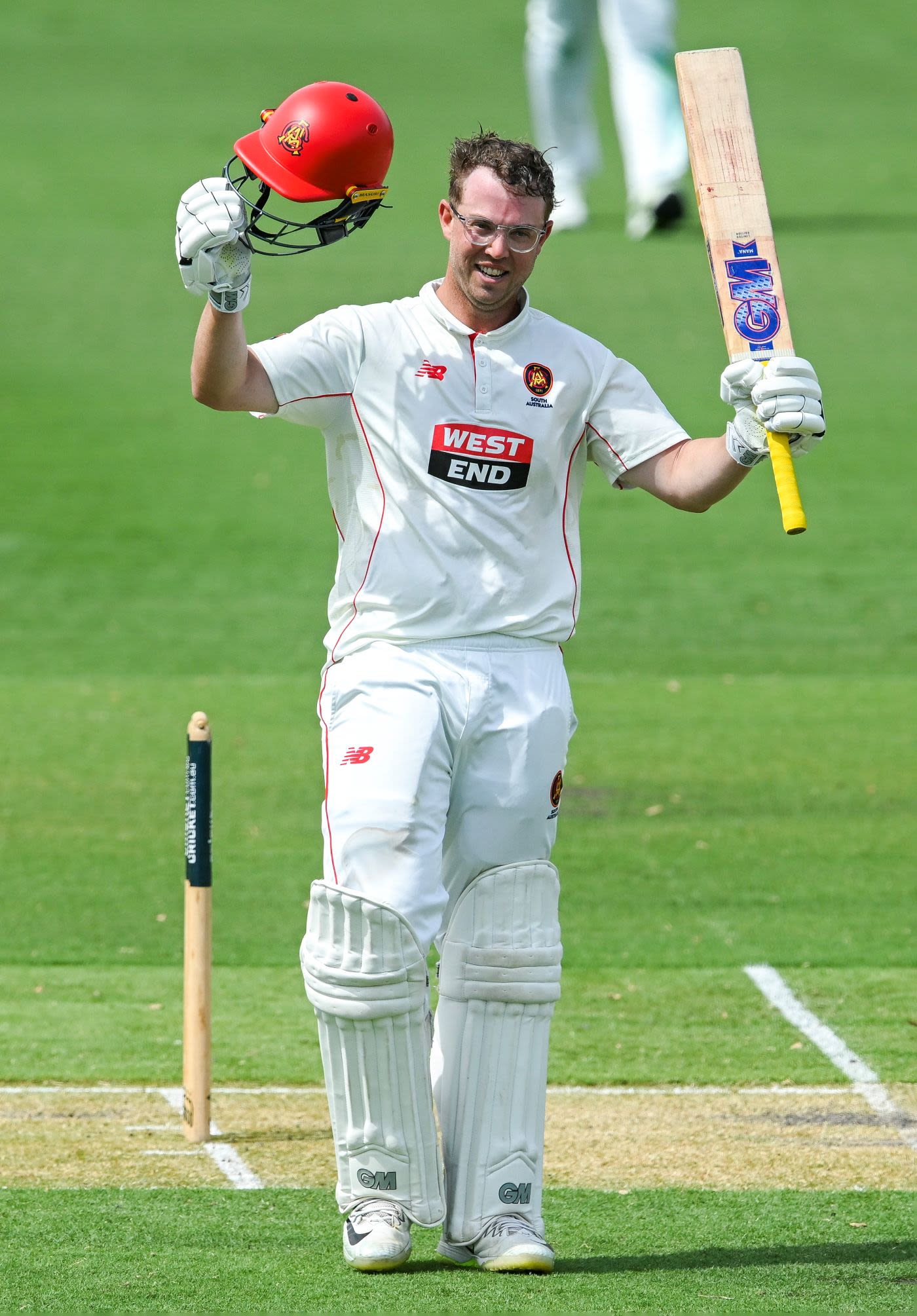 Conor McInerney celebrates his maiden first-class century