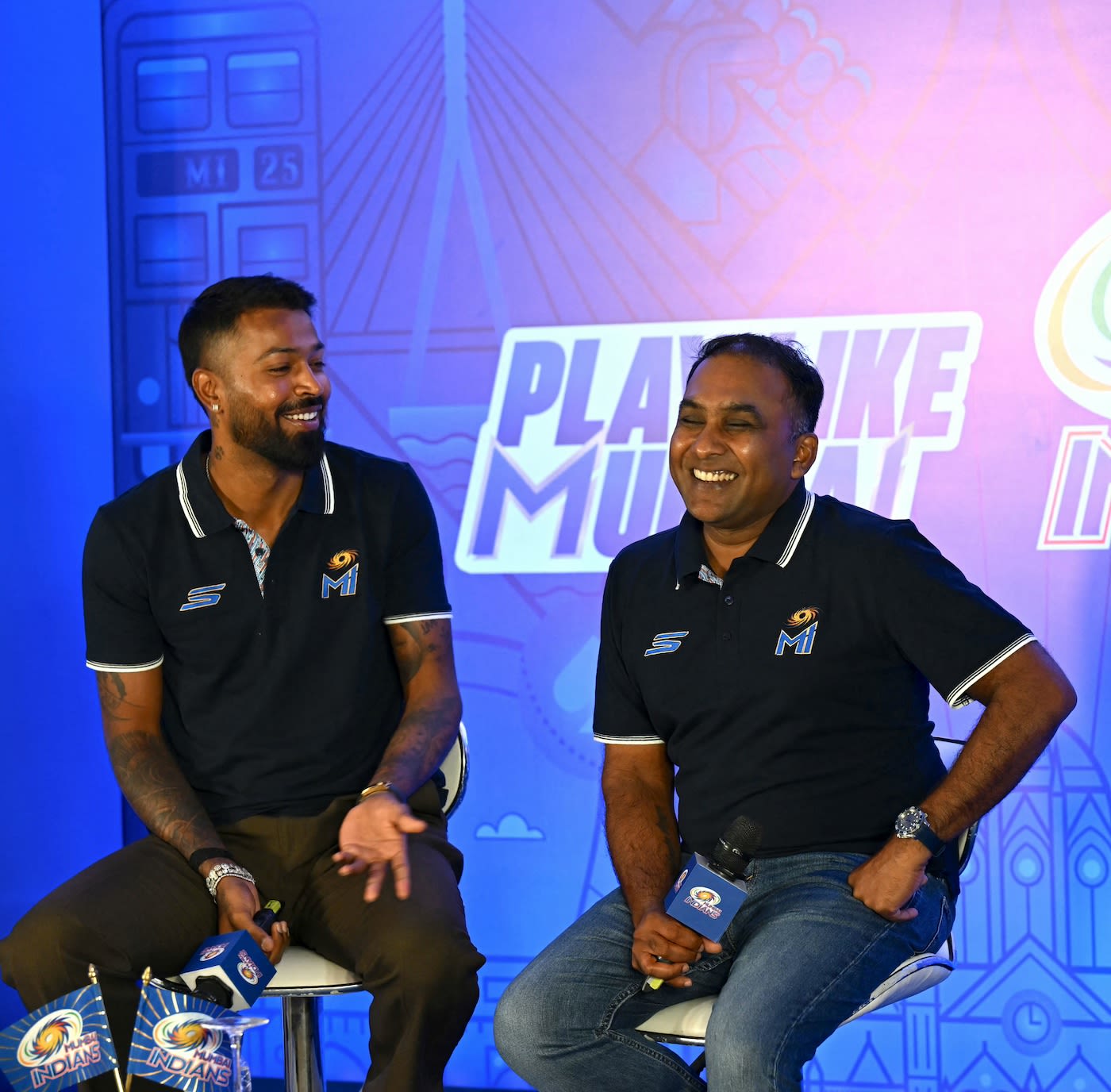 Hardik Pandya and Mahela Jayawardene share a laugh at a press meet