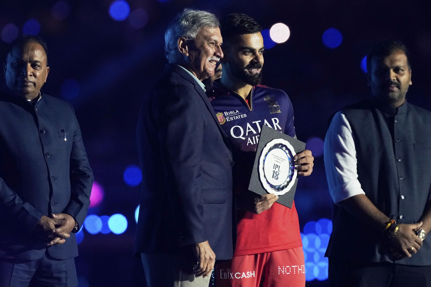 Virat Kohli gets a memento from BCCI president Roger Binny