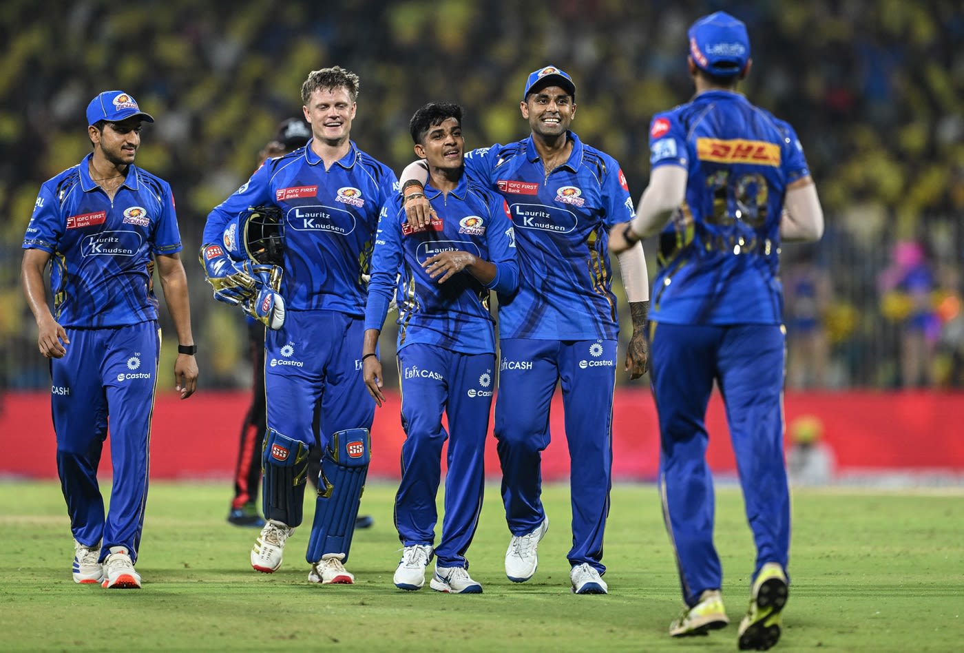Vignesh Puthur is mobbed by his team-mates