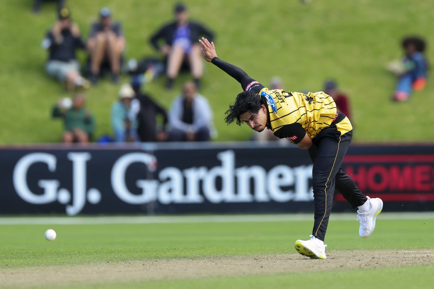Muhammad Abbas bends his back