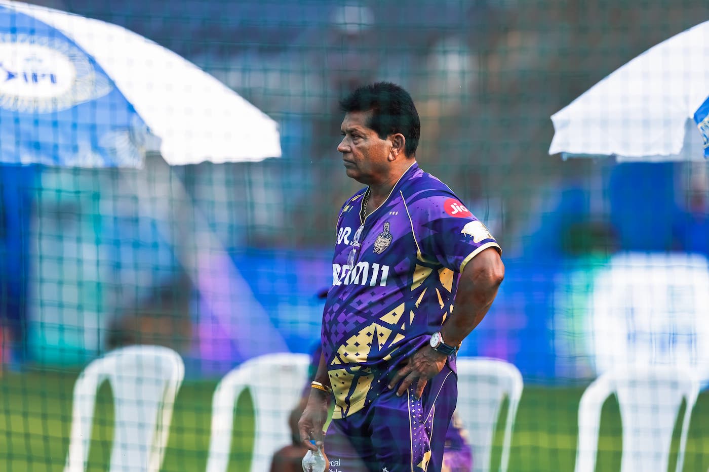 KKR coach Chandrakant Pandit watches on