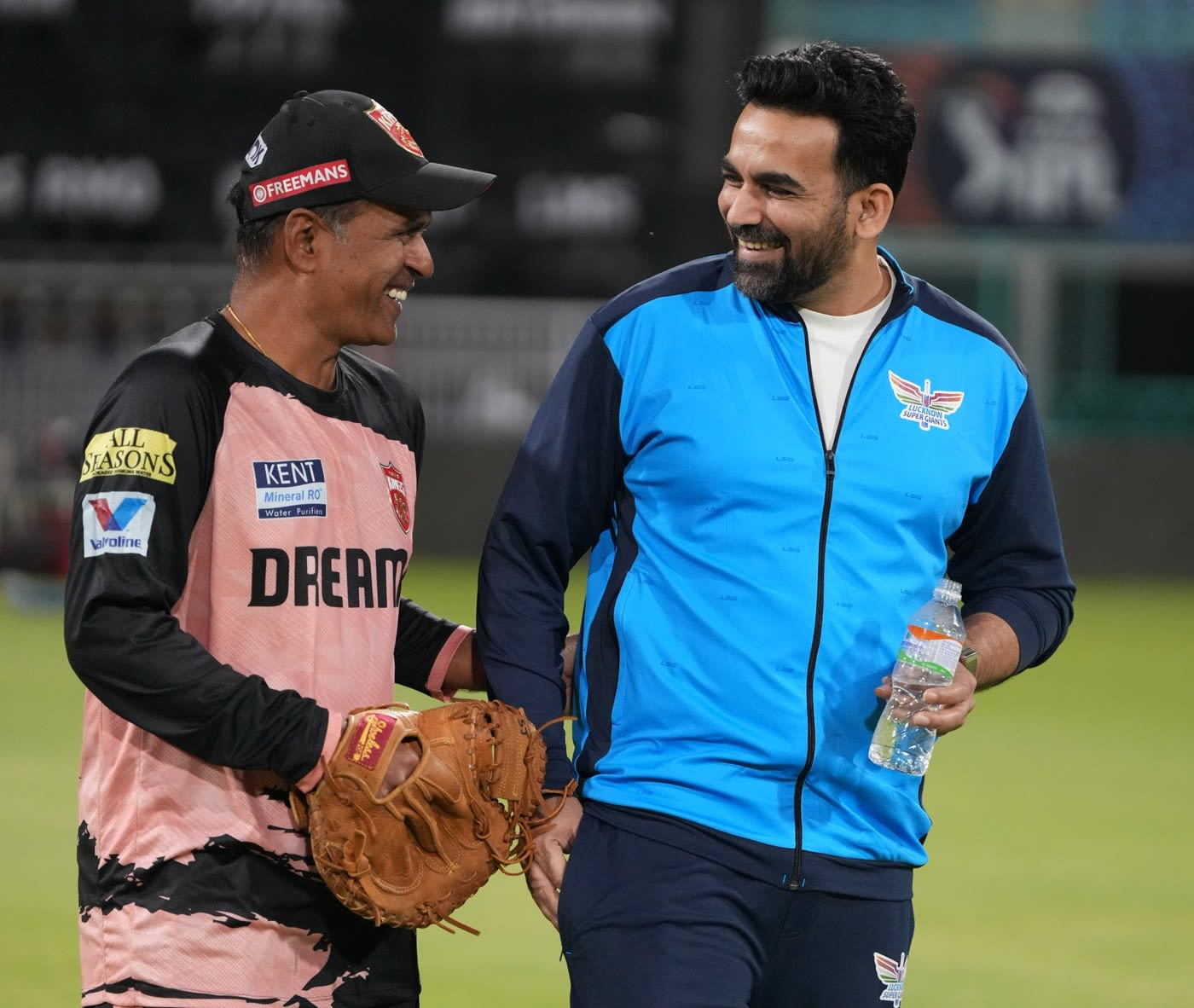 Sunil Joshi and Zaheer Khan share a light moment