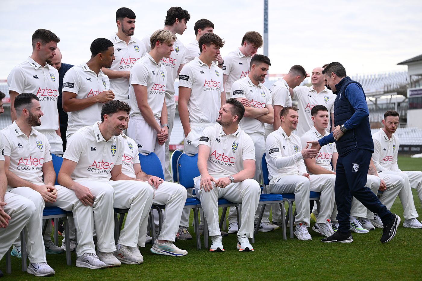 Ryan Campbell shakes Scott Borthwick's hand as the Durham players prepare for their team photo