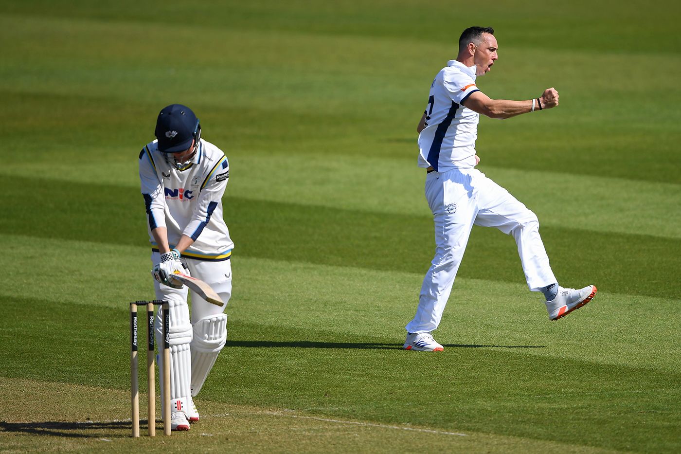 Kyle Abbott celebrates the dismissal off George Hill