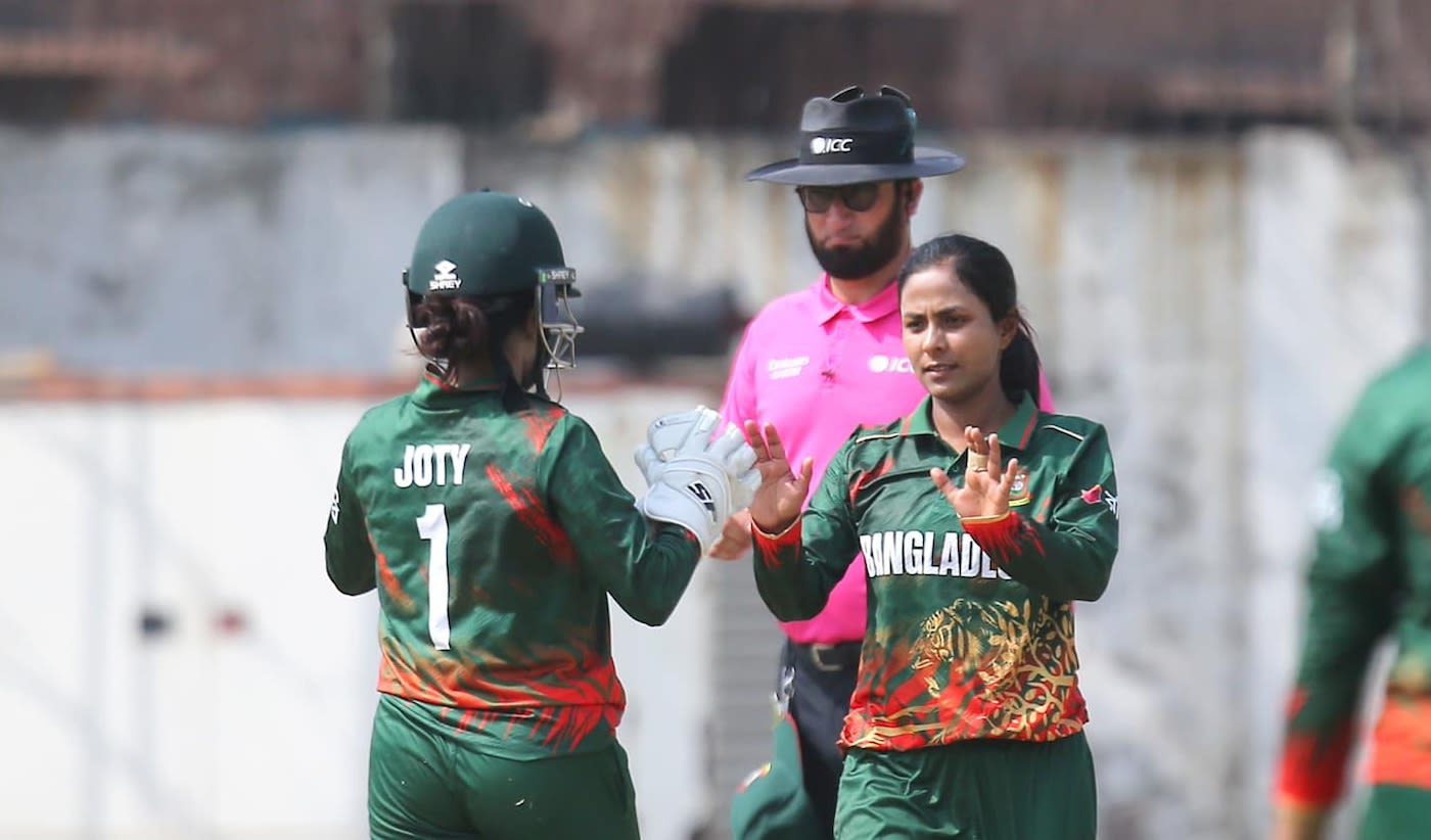 Jannatul Ferdus celebrates one of her five wickets with her captain