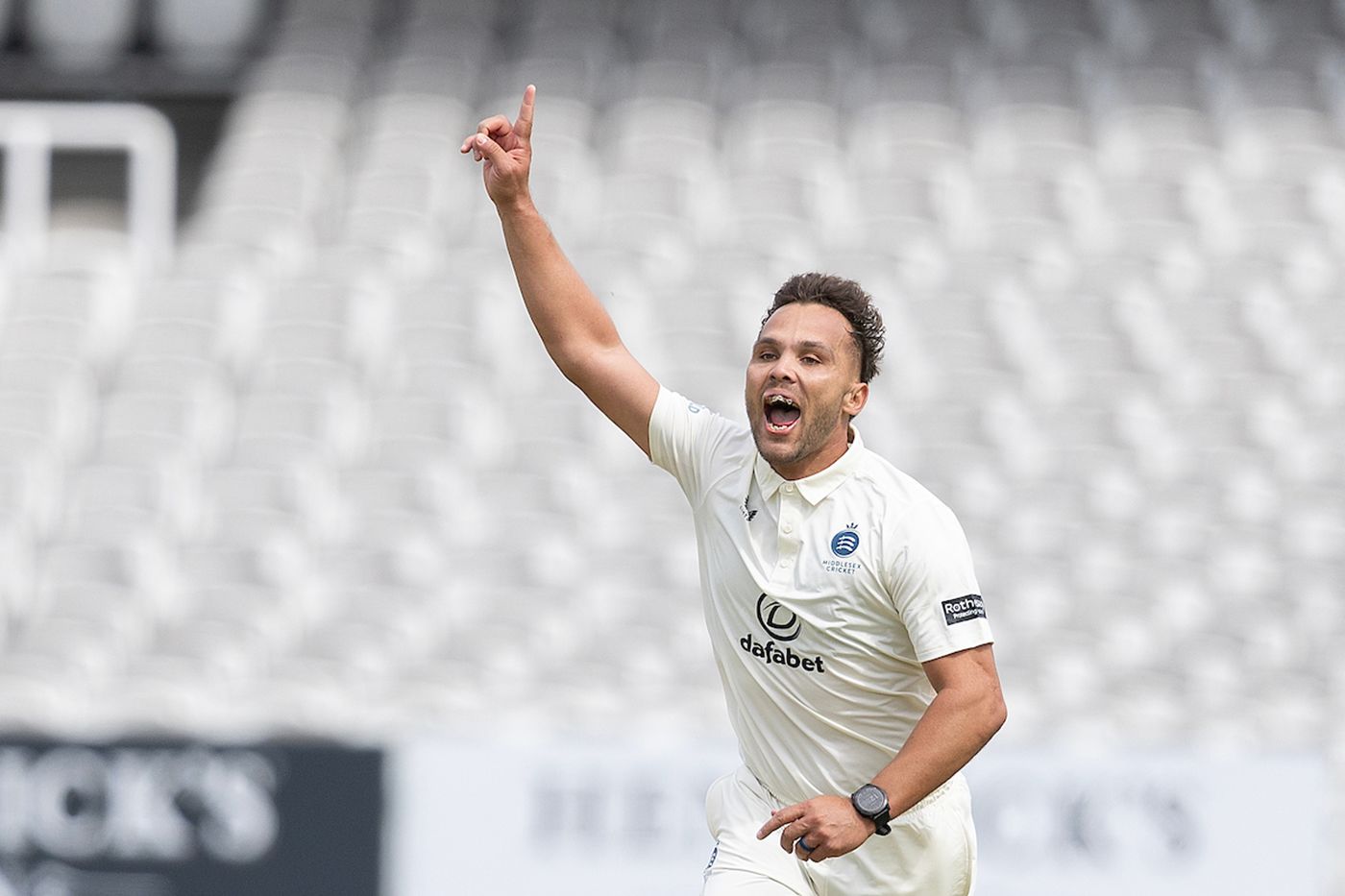 Dane Paterson celebrates a wicket on Middlesex debut