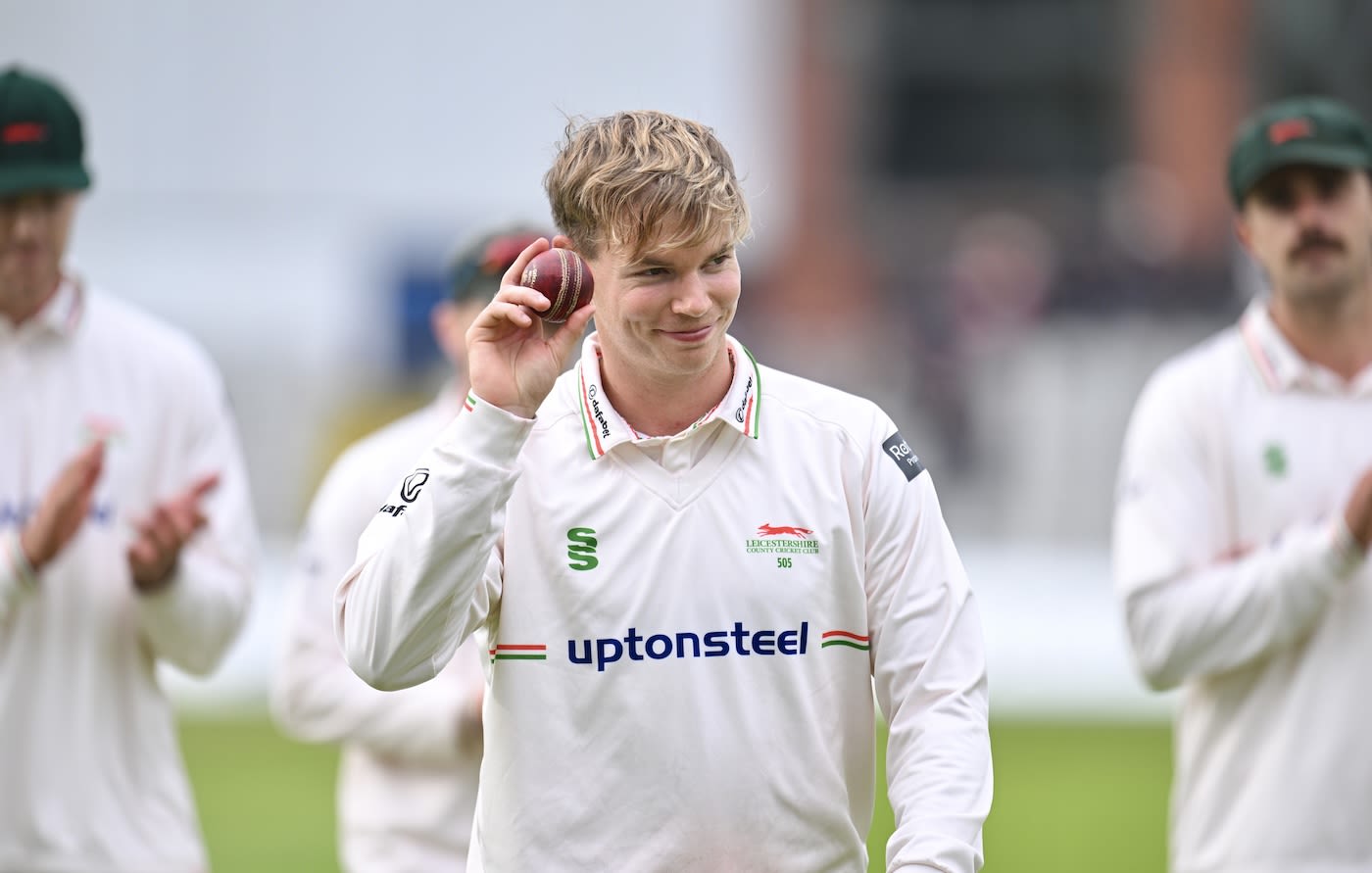 Tom Scriven celebrates his maiden five-wicket haul
