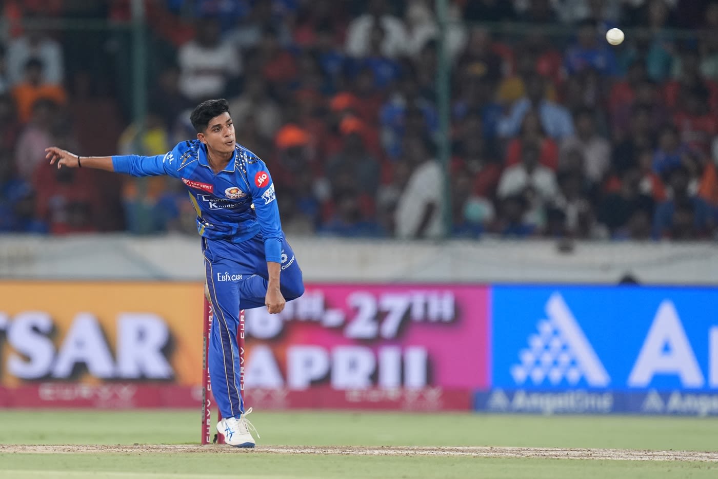 Vignesh Puthur tosses the ball up