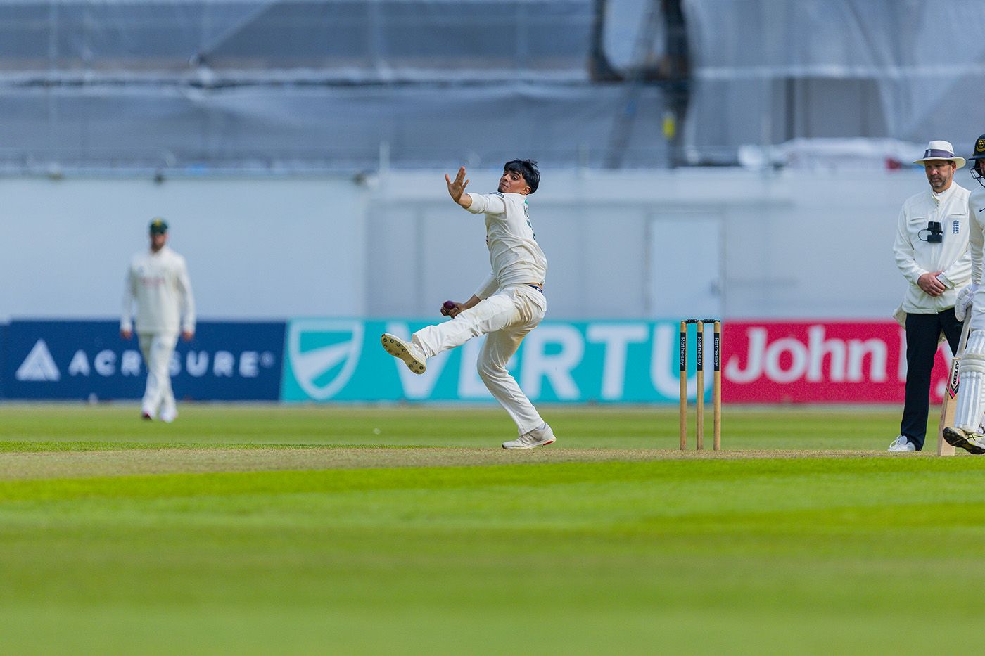 Farhan Ahmed in his delivery stride