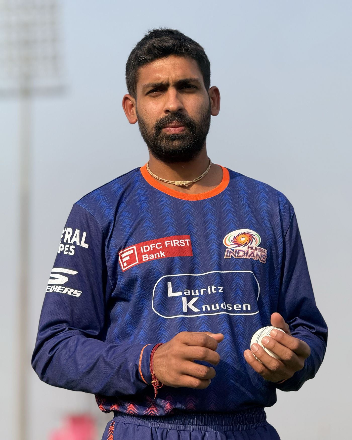 Raghu Sharma looks on