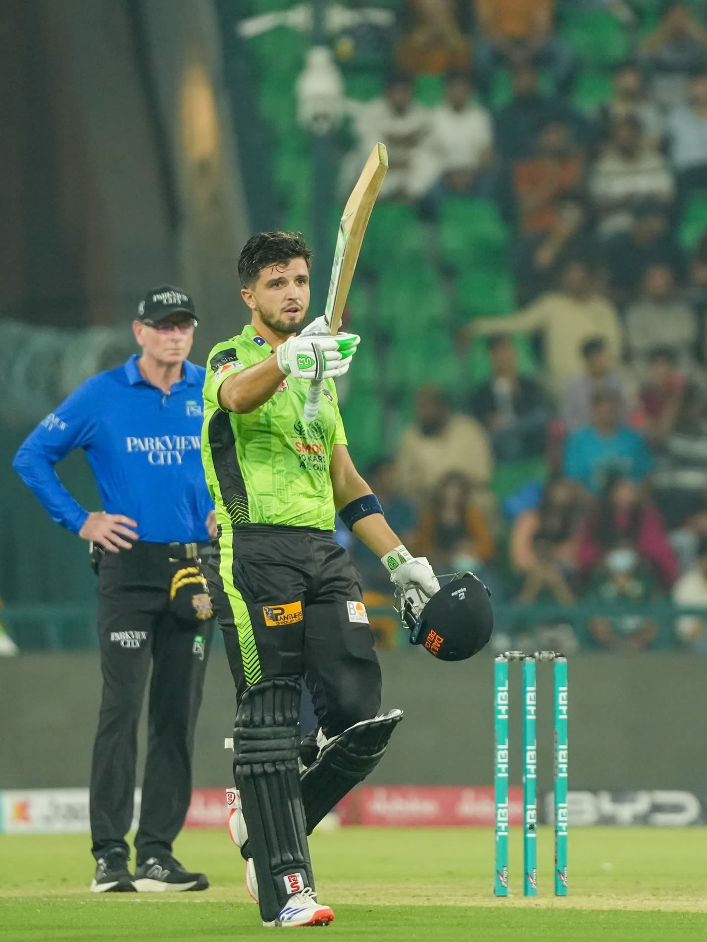 Mohammad Naeem celebrates a 28-ball fifty