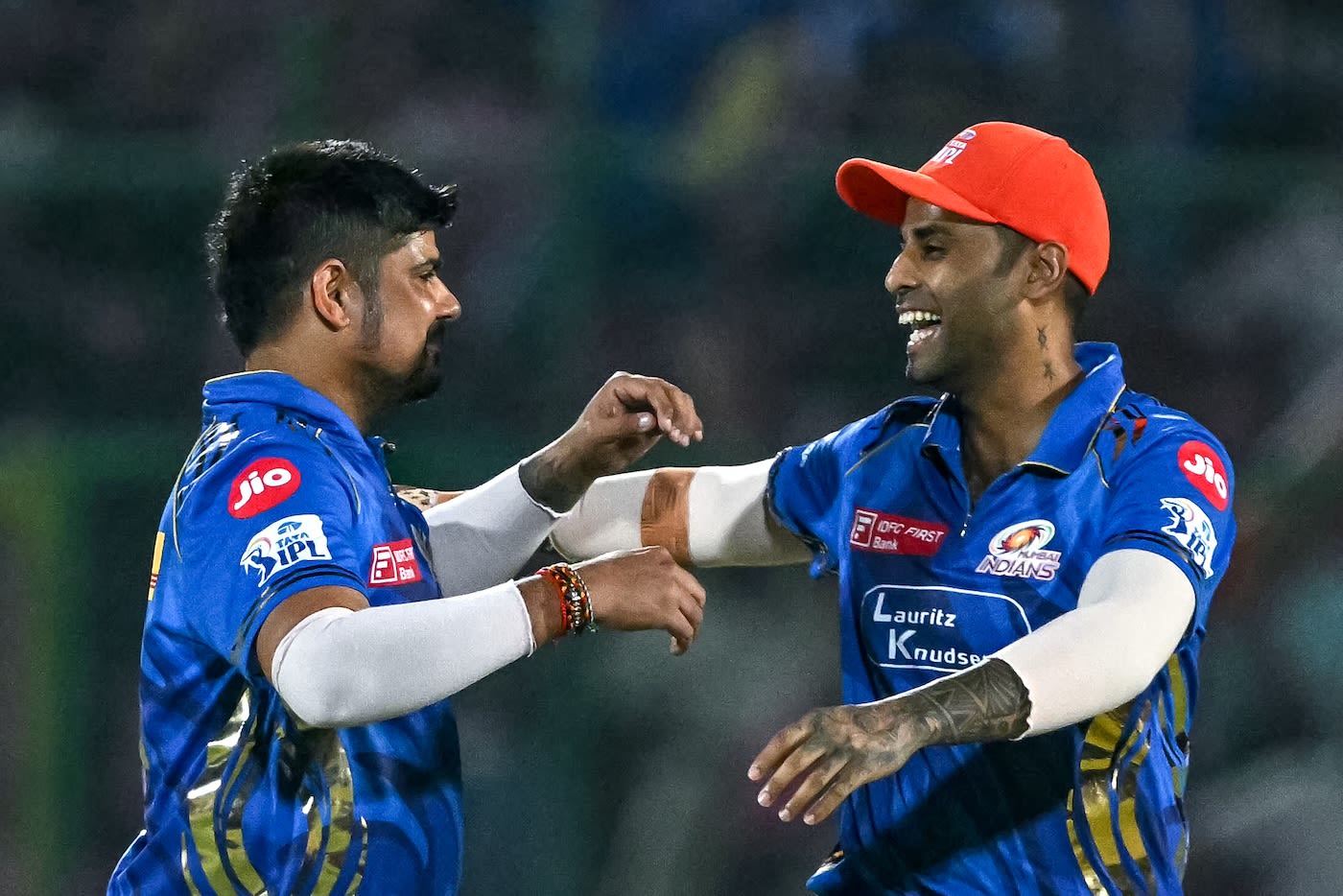 Suryakumar Yadav gets ready to embrace wicket-taker Karn Sharma
