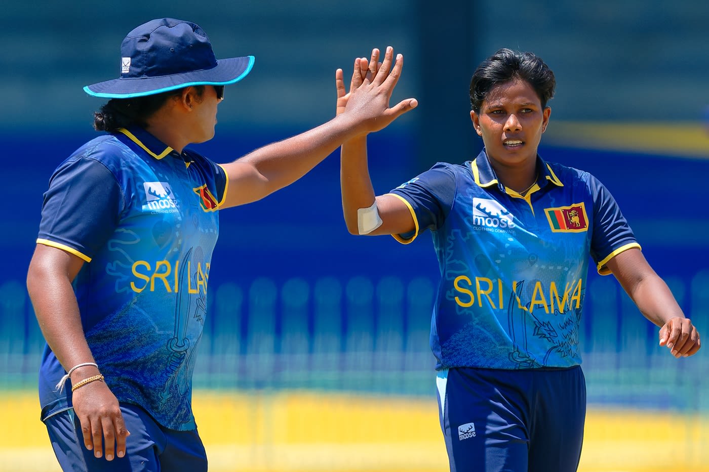 Malki Madara celebrates a wicket with Chamari Athapaththu