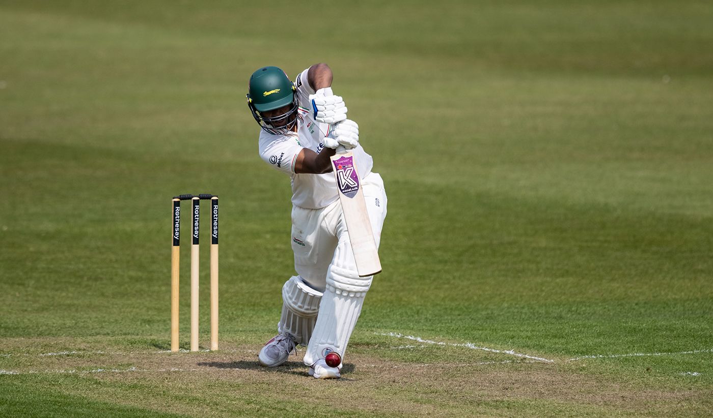 Rishi Patel drives on the way to a century