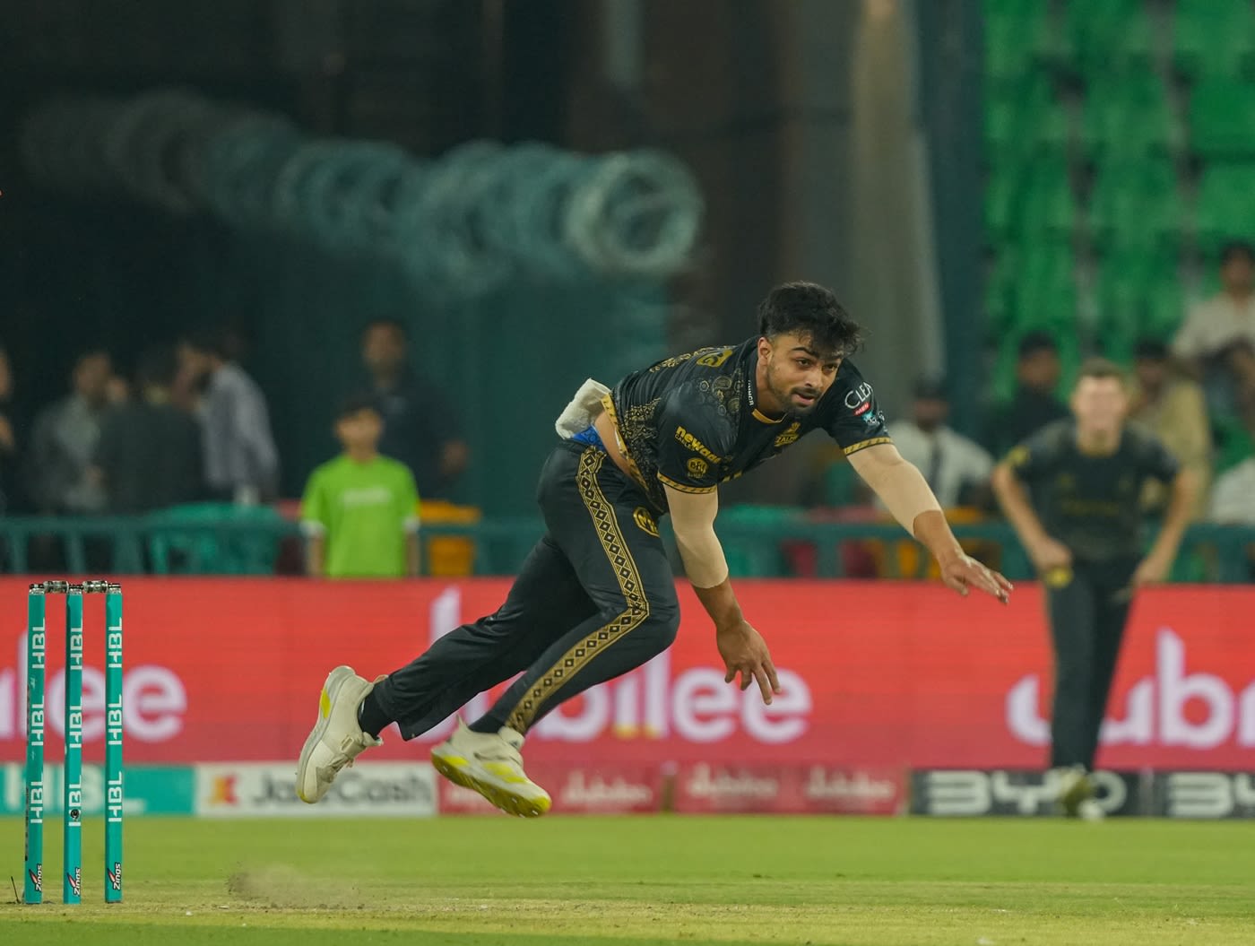 Ahmed Daniyal bends his back