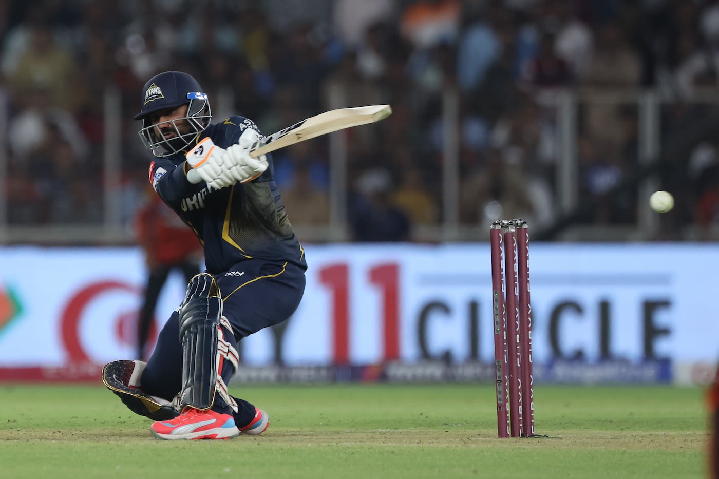 Rahul Tewatia goes down on one knee to play a reverse pull