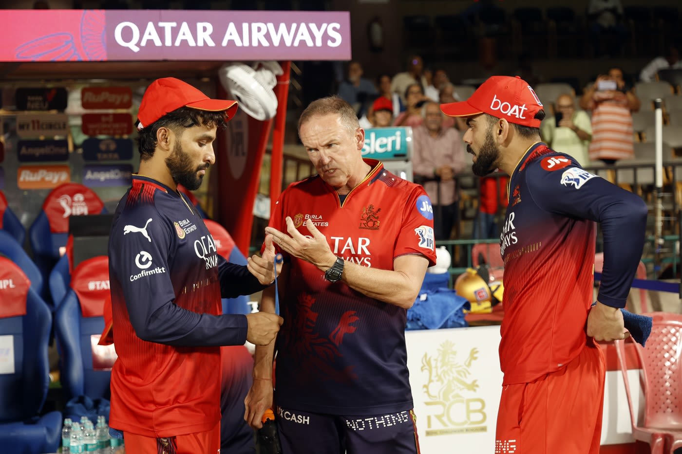 RCB's leadership group of captain Rajat Patidar, head coach Andy Flower, and Virat Kohli have a chat