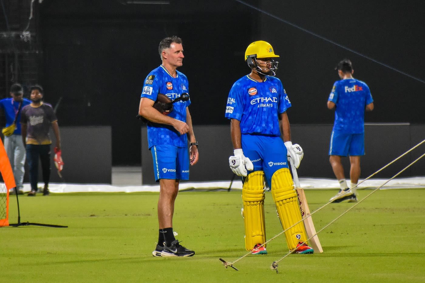 Mike Hussey works with Ayush Mhatre at the nets