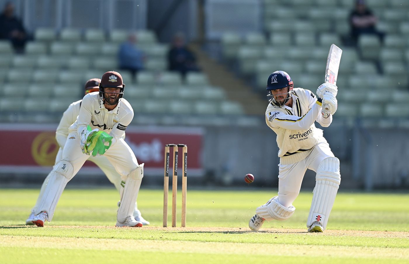 Ed Barnard drives as Ben Foakes looks on