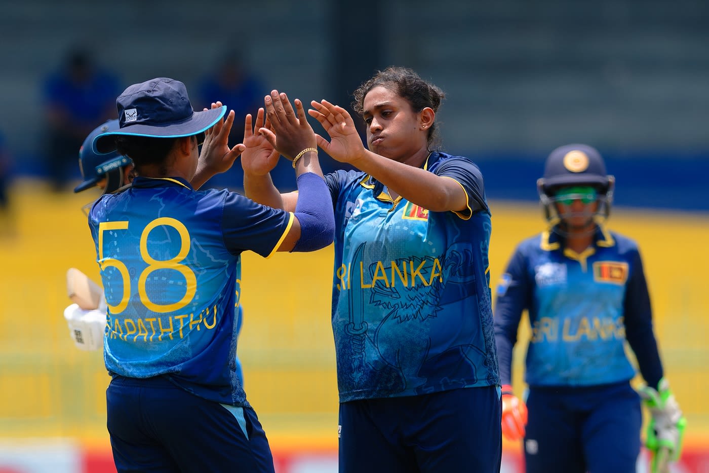 A relieved Dewmi Vihanga celebrates after seeing the back of Smriti Mandhana