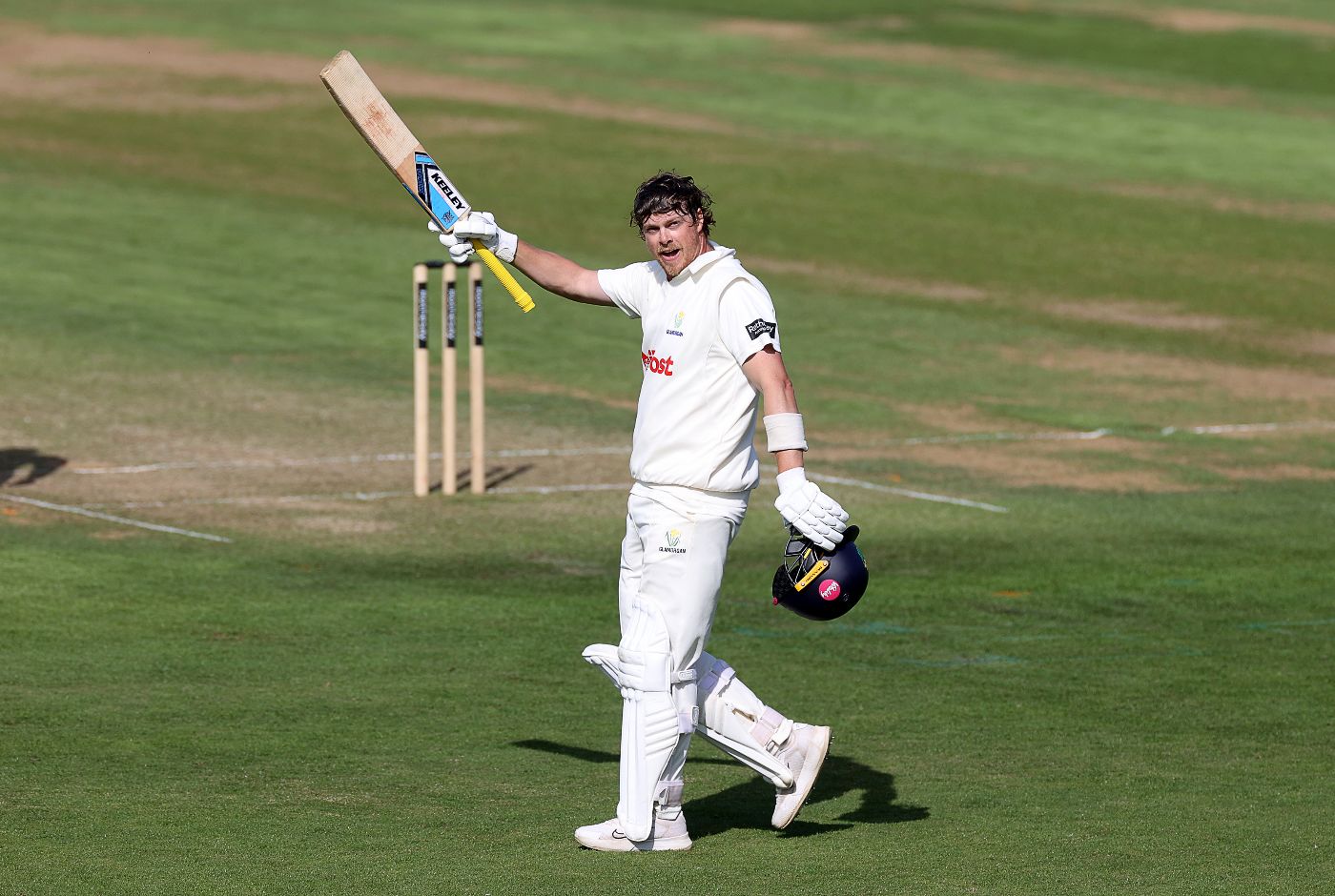 Sam Northeast celebrates his first century of the season