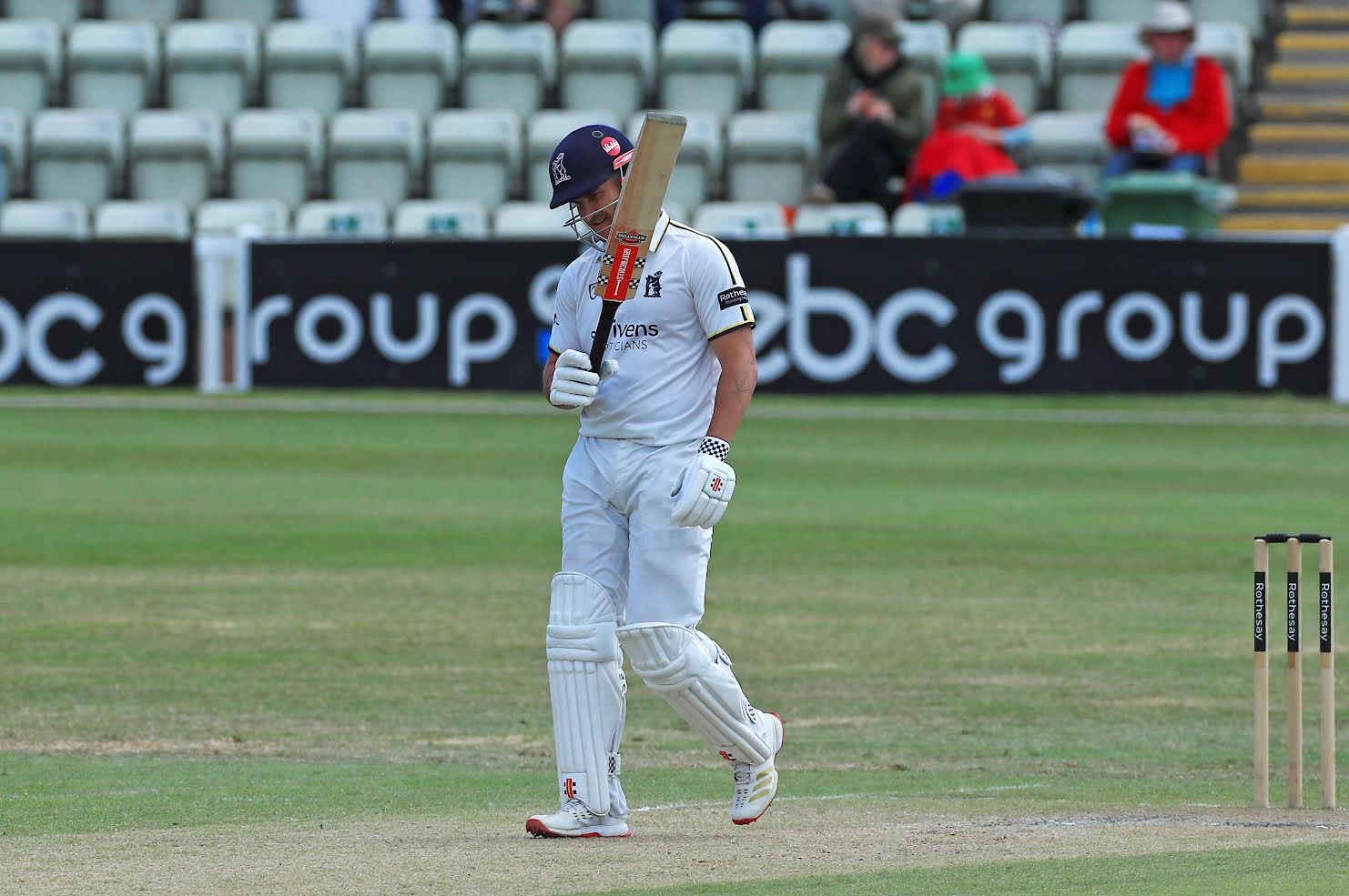 Sam Hain acknowledges his second half-century of the match