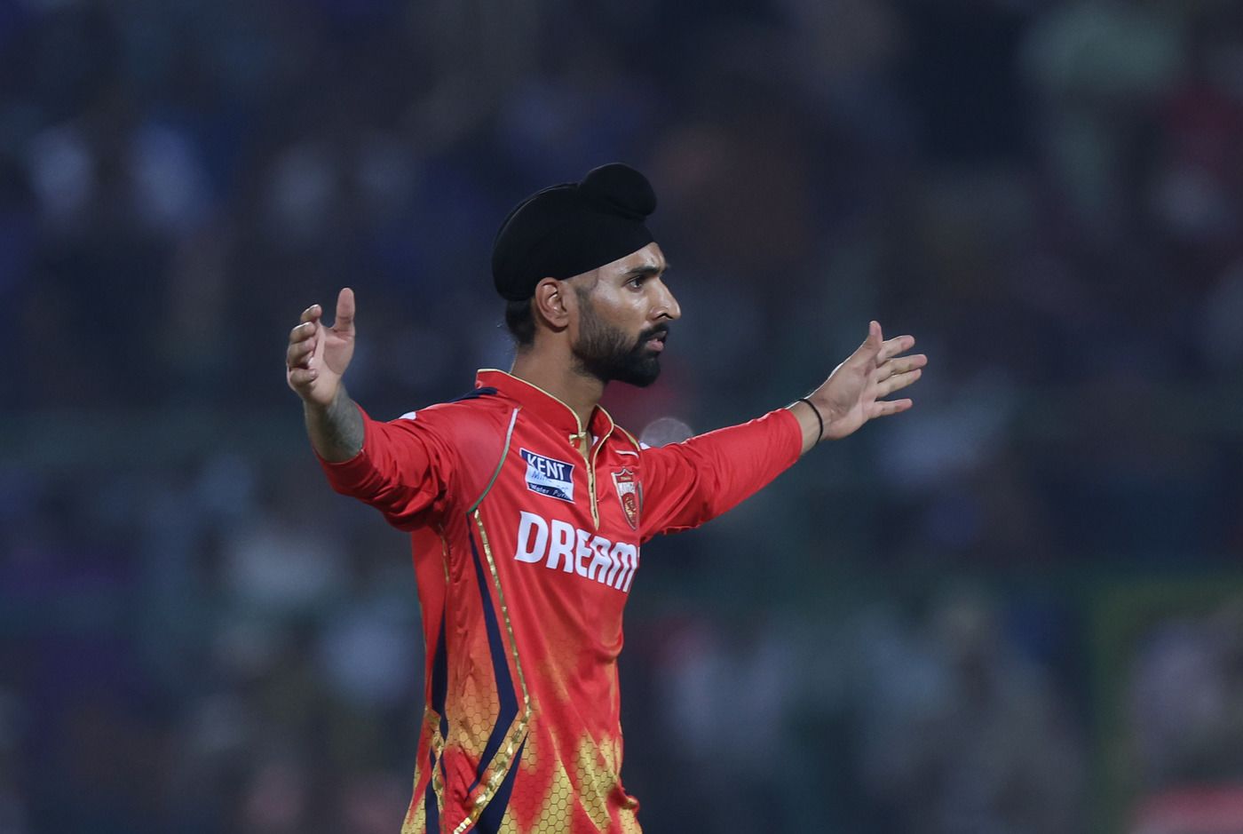 Harpreet Brar celebrates after accounting for Rohit Sharma