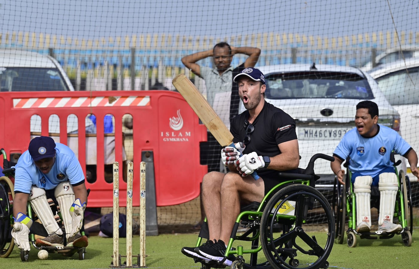 AB de Villiers reacts after missing a ball while at a Mumbai Wheelchair cricket team training session