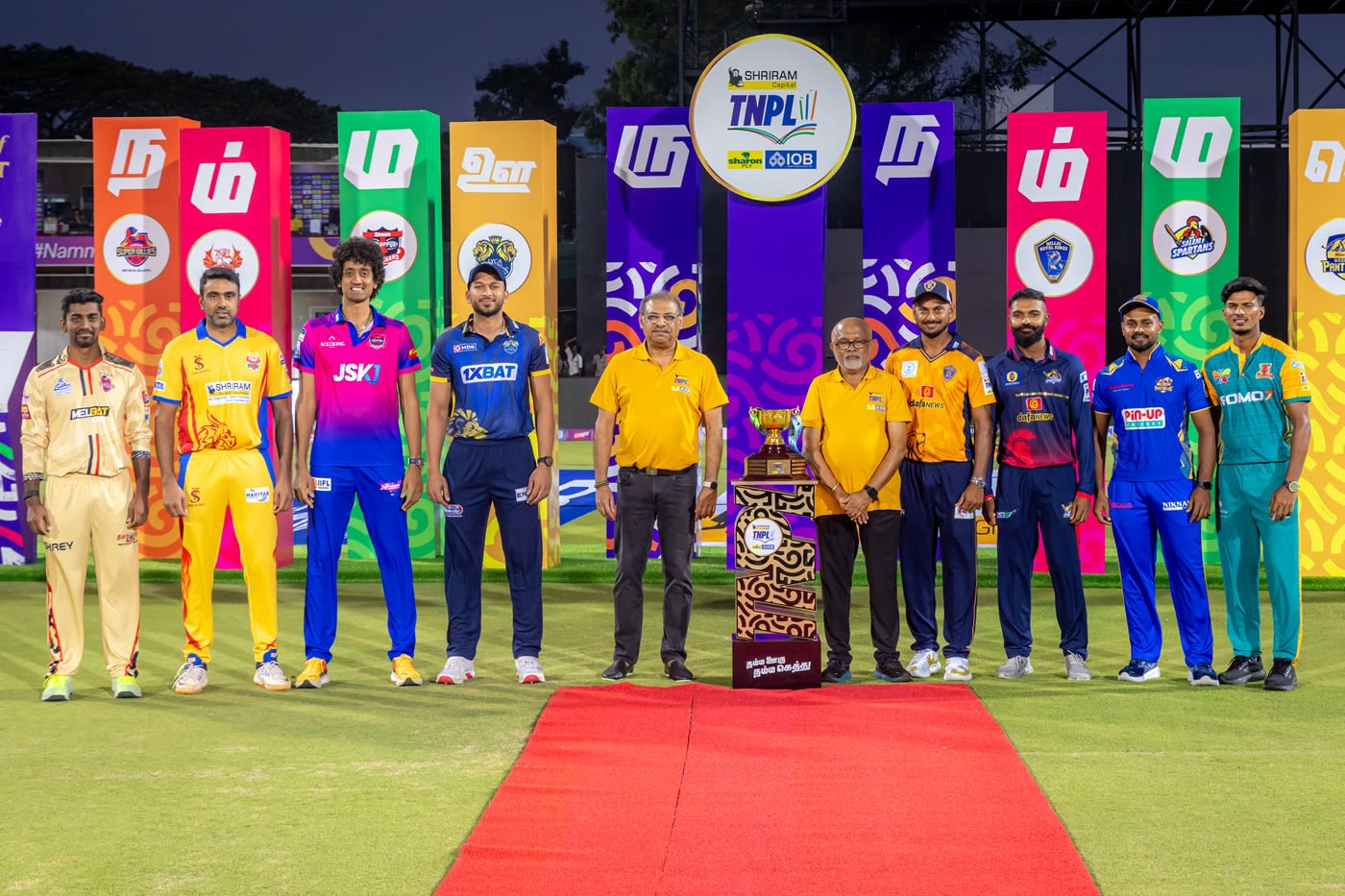 B Aparajith, R Ashwin, R Sai Kishore, M Shahrukh Khan, KB Arun Karthik, S Abishiek, NS Chaturved, J Suresh Kumar pose with the TNPL trophy