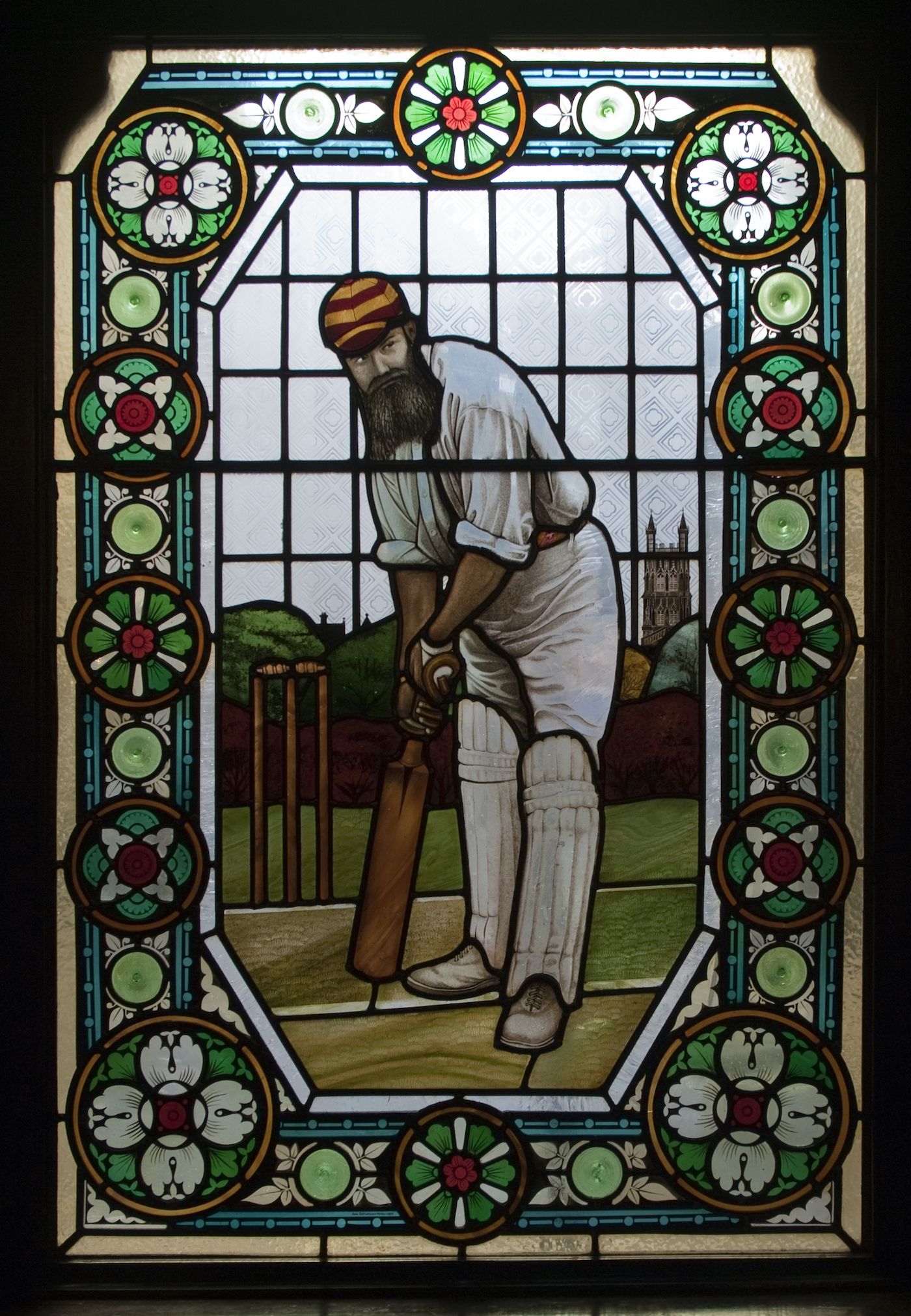 A stained-glass window depicting cricketer WG Grace in the Champion public house
