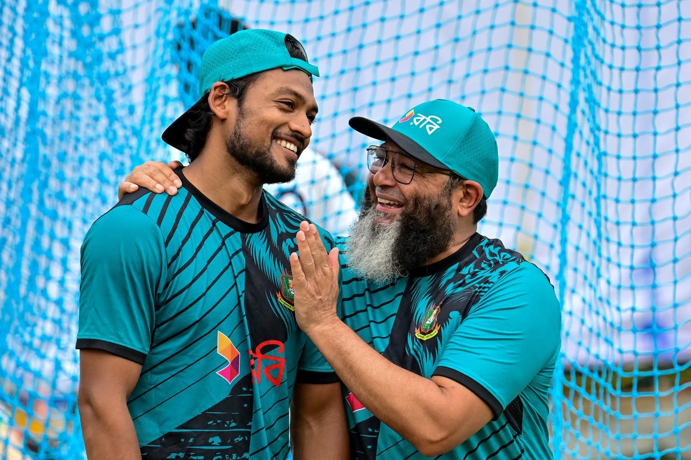 Najmul Hossain Shanto shares a lighter moment with spin-bowling coach Mushtaq Ahmed