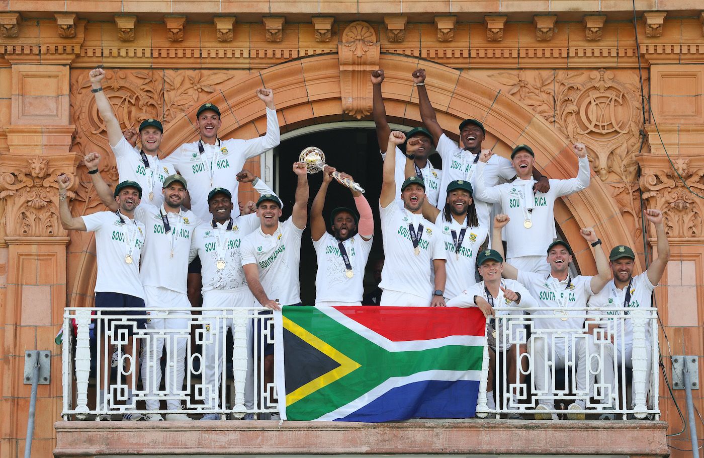 South Africa's players celebrate with the WTC mace on the Lord's balcony