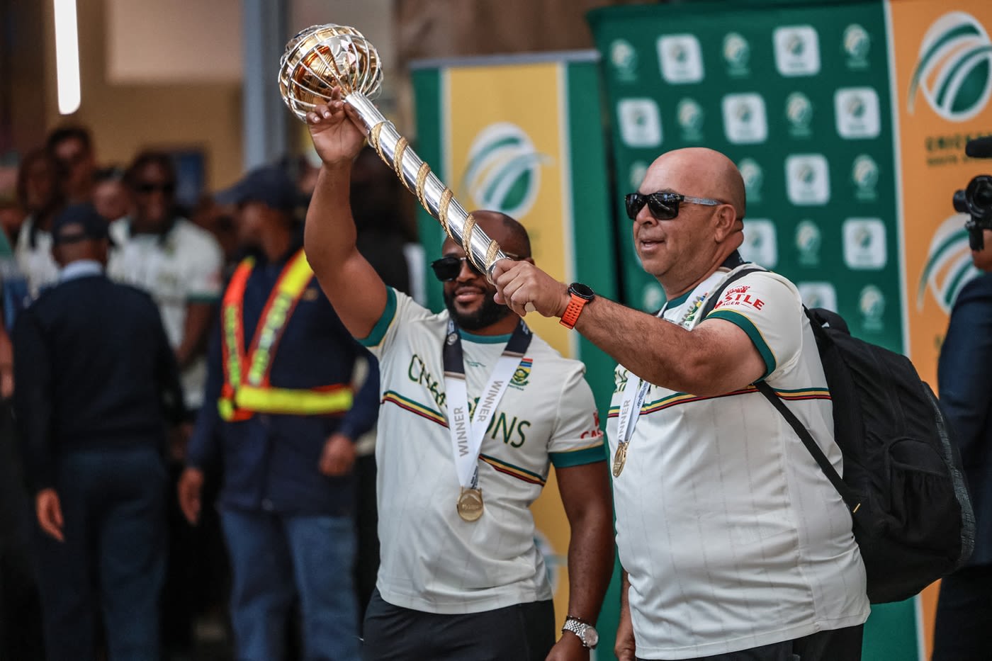 Temba Bavuma and coach Shukri Conrad arrive with the mace