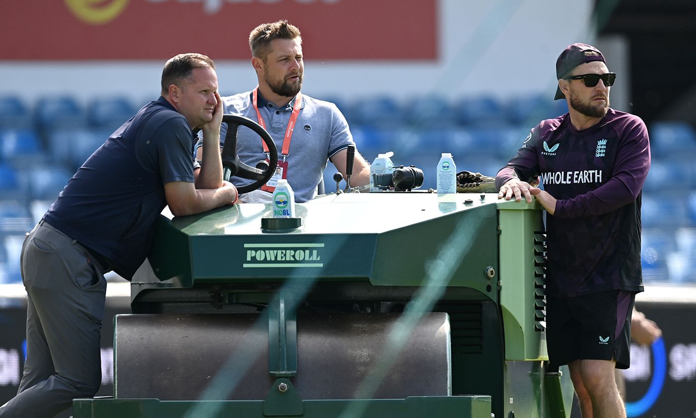 Rob Key, Luke Wright and Brendon McCullum chat on the sidelines at England training