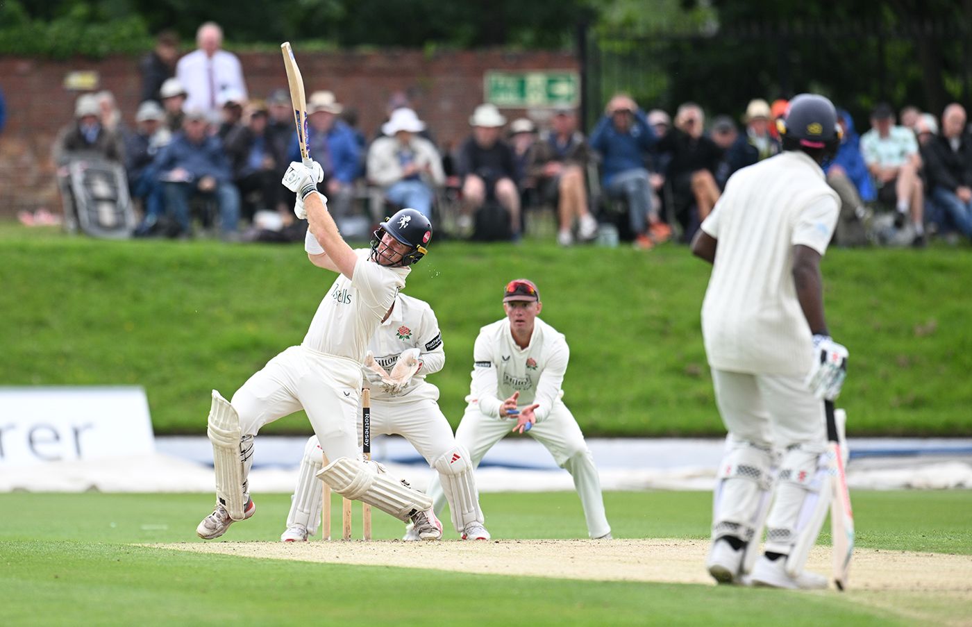 Ben Compton heaves the ball leg side