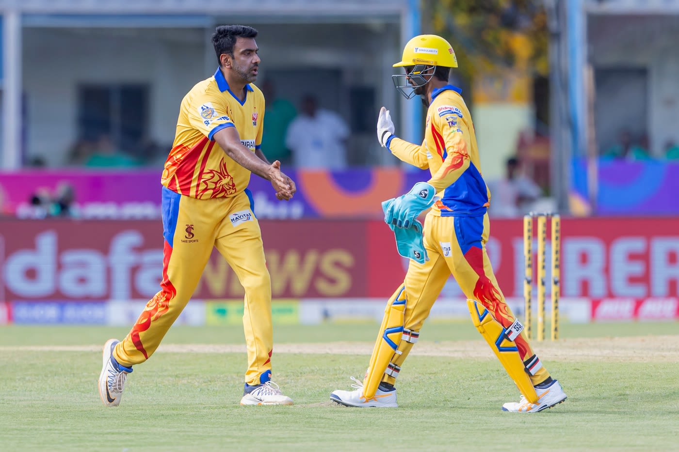 R Ashwin celebrates a wicket with B Indrajith