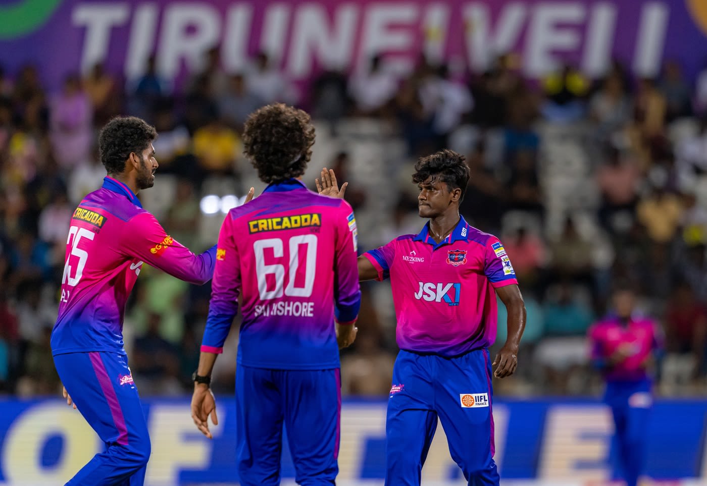 A Esakkimuthu celebrates a wicket with R Sai Kishore and Mohamed Ali