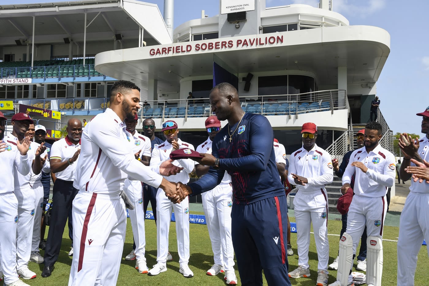 Brandon King receives his Test cap from Daren Sammy